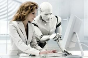 persona che lavora con computer e robot